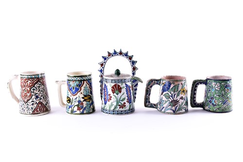 Lot 285 - A collection of Iznik decorated pottery,...