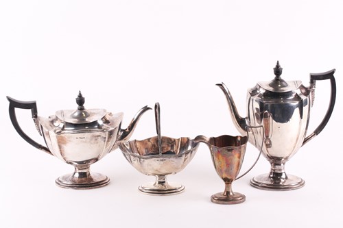 Lot 305 - A George V four-piece silver tea set,...