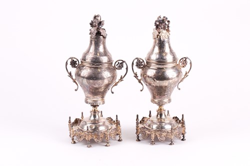 Lot 326 - A pair of Middle Eastern white metal baluster...