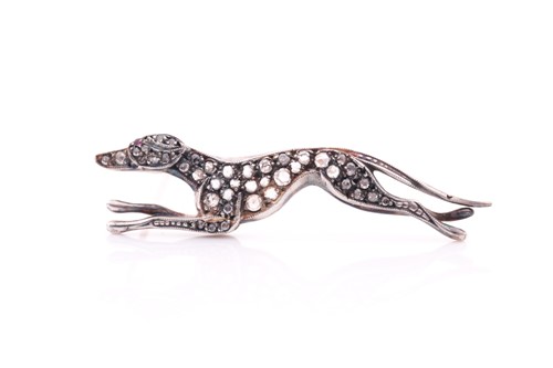 Lot 191 - A silver gilt and diamond novelty brooch in...