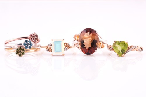 Lot 165 - Four gem set rings, two set in 9 carat gold,...