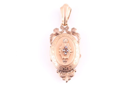 Lot 271 - A Victorian yellow metal and pearl locket, the...