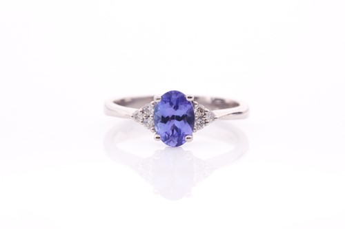 Lot 173 - A 9ct white gold, diamond, and tanzanite ring,...
