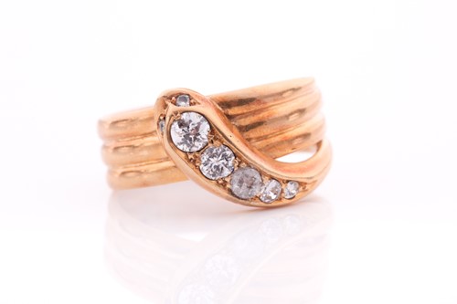 Lot 200 - An 18ct yellow gold and diamond snake ring,...