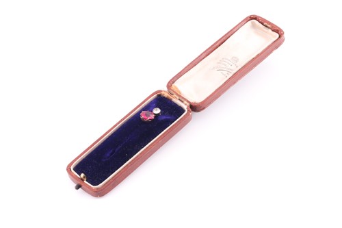 Lot 183 - A yellow metal and diamond tie pin, set with...