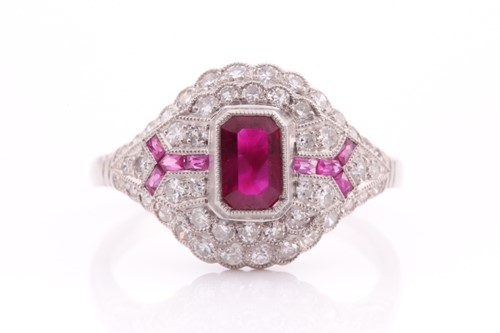 Lot 67 - An Art Deco diamond and ruby ring, inset with...
