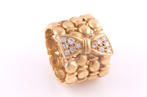 Lot 202 - A diamond set dress ring; the pavé set diamond...
