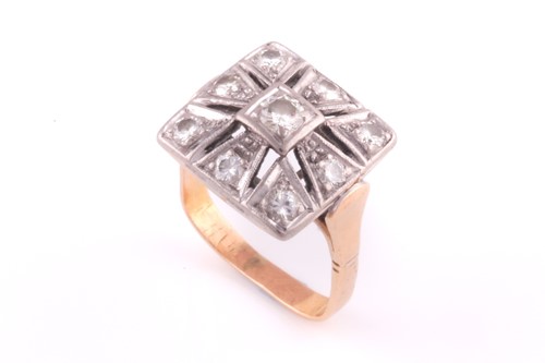 Lot 243 - An Art Deco diamond ring; the nine stone...