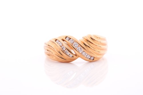 Lot 171 - An 18ct yellow gold and diamond ring, the...