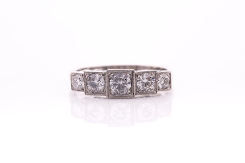 Lot 13 - A platinum and diamond ring, the five...