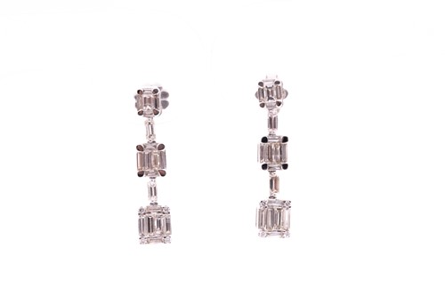 Lot 131 - A pair of 18ct white gold and diamond drop...