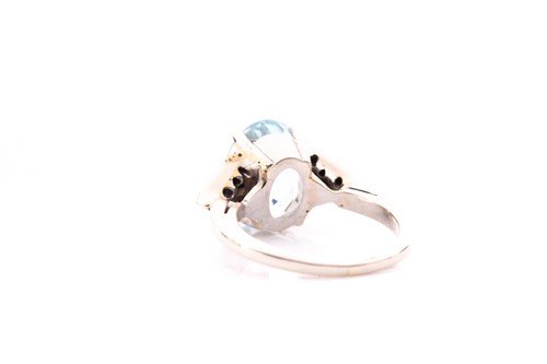 Lot 31 - A 14ct white gold, diamond, and aquamarine...