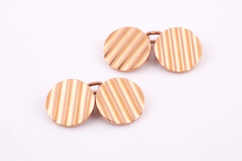 Lot 169 - A pair of yellow metal cufflinks by Mellerio...
