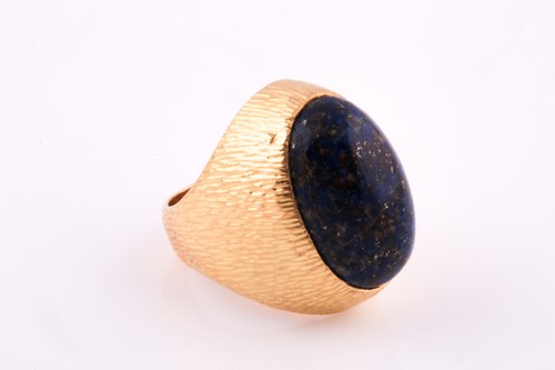 Lot 176 - Grima. An 18ct yellow gold and lapis lazuli...
