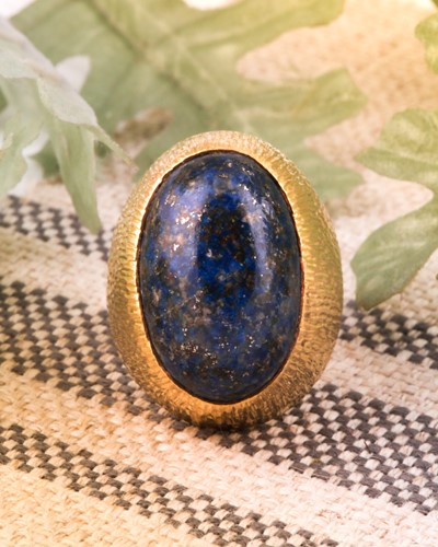 Lot 176 - Grima. An 18ct yellow gold and lapis lazuli...