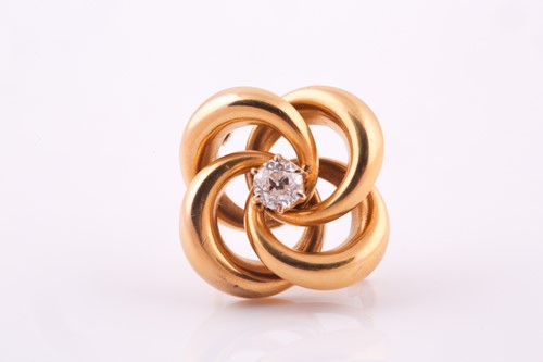 Lot 27 - A lovers knot brooch, in yellow metal with...