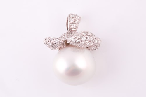 Lot 231 - A South Sea pearl and diamond pendant, the...