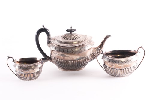 Lot 41 - A late Victorian three-piece silver teaset,...