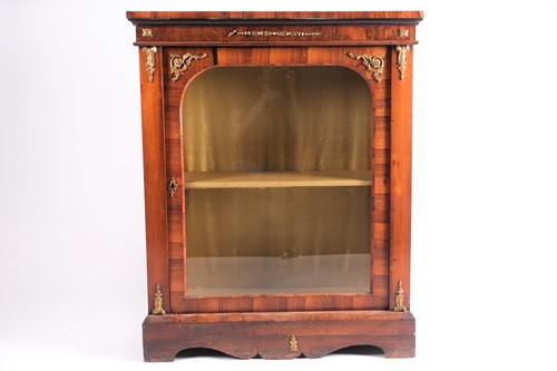 Lot 149 - A Victorian figured rosewood pier cabinet,...