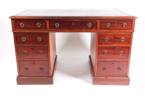 Lot 129 - An Edwardian mahogany kneehole writing desk....