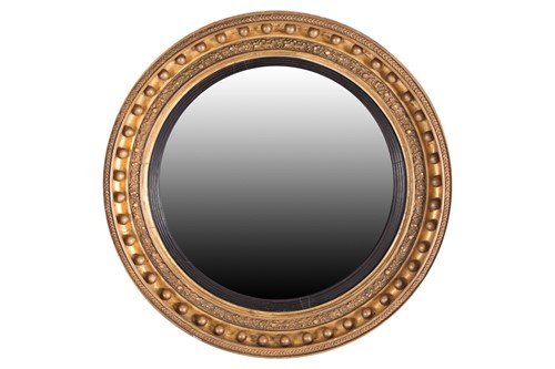 Lot 173 - A large and impressive Regency circular carved...