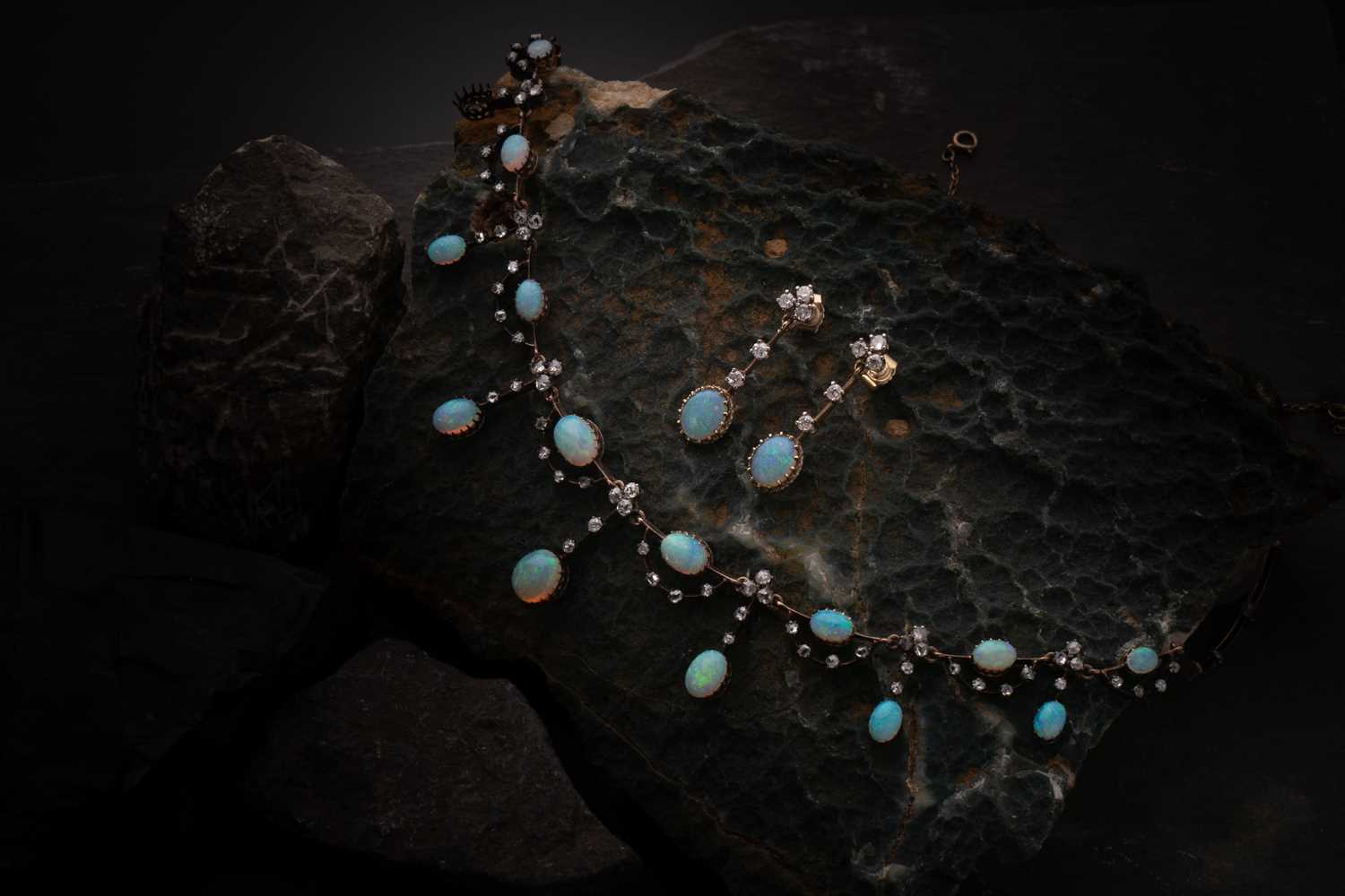 Lot 422 - An Edwardian opal and diamond fringe necklace,...