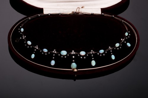 Lot 422 - An Edwardian opal and diamond fringe necklace,...