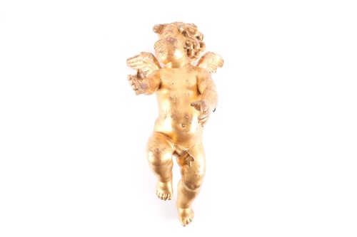 Lot 29 - A large and decorative gilt-painted wooden...
