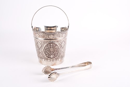 Lot 258 - An Indo-Persian silver swing-handle ice bucket,...