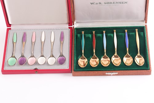 Lot 250 - A set of six silver gilt and guilloché enamel...
