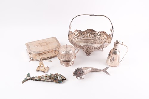 Lot 264 - A probably Syrian white metal oval cake basket...