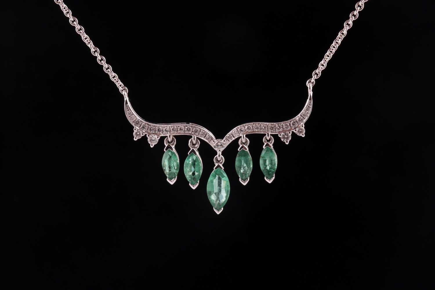 Lot 23 - An emerald and diamond necklace; the...