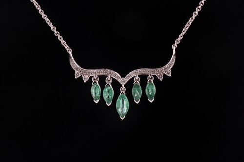 Lot 23 - An emerald and diamond necklace; the...