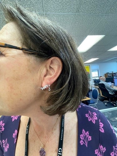 Lot 64 - A pair of ruby and diamond earrings; styled as...