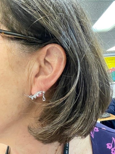 Lot 64 - A pair of ruby and diamond earrings; styled as...