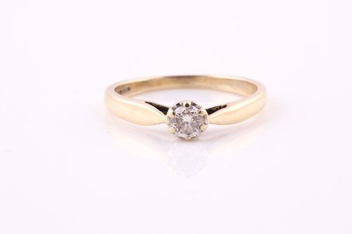 Lot 79 - A single stone diamond ring; the round...