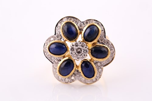 Lot 41 - A sapphire and diamond foliate cluster ring;...