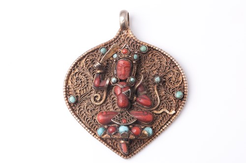 Lot 154 - A Tibetan white metal blind filigree worked...