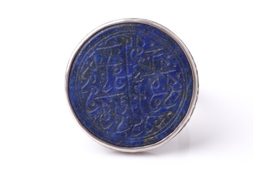 Lot 255 - A probably Persian white metal dress ring set...