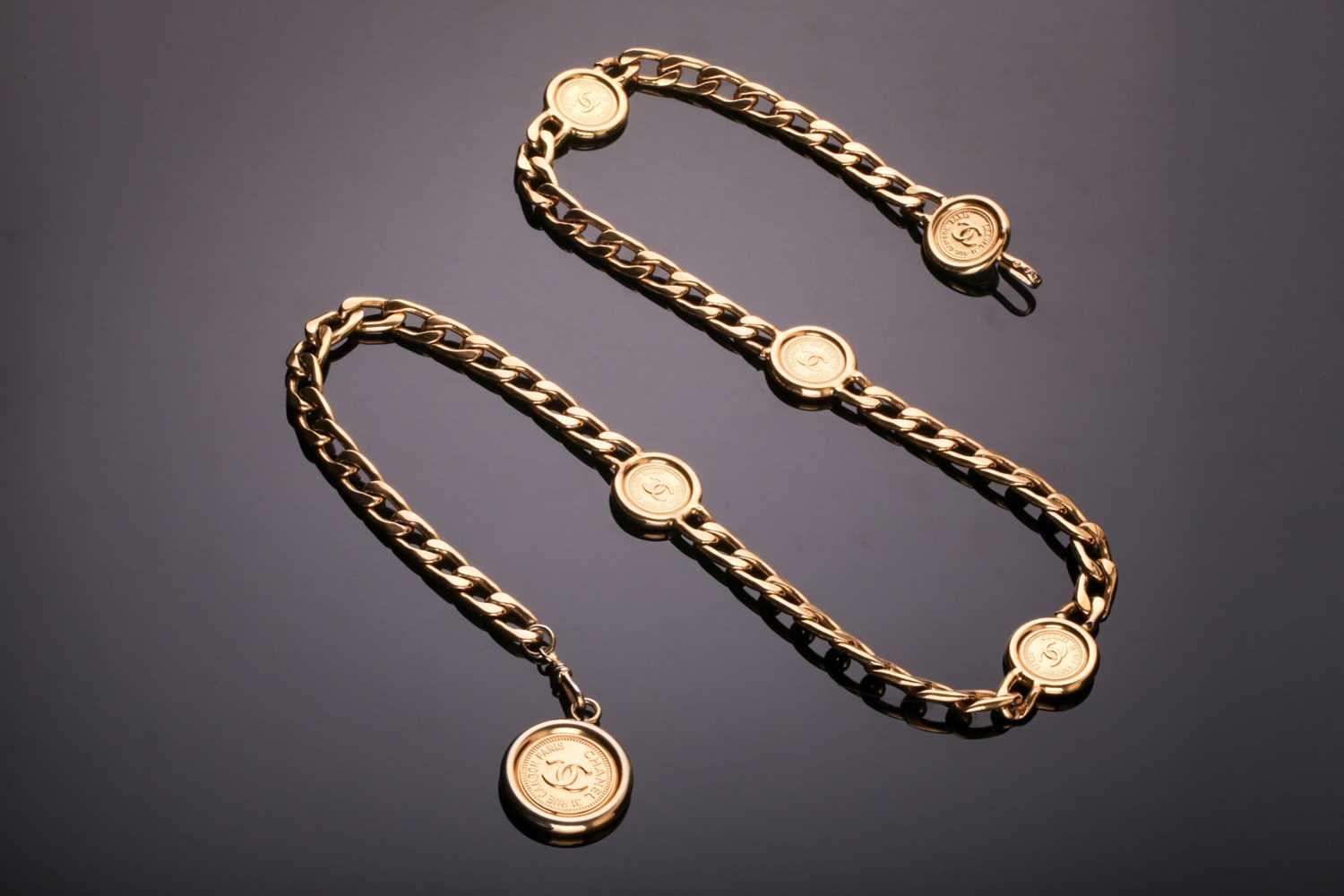 Lot 11 - A Chanel "31 Rue Cambon Paris" belt, the gold...