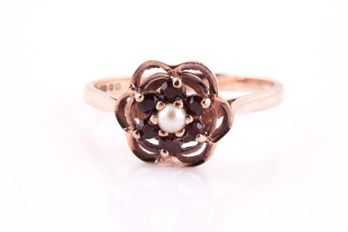 Lot 459 - A 9ct yellow gold, garnet and pearl dress ring,...