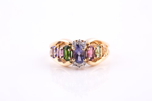 Lot 241 - A yellow metal and multi-gem set ring, set...