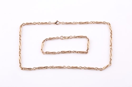 Lot 212 - A 9ct yellow gold facny twist-link necklace,...