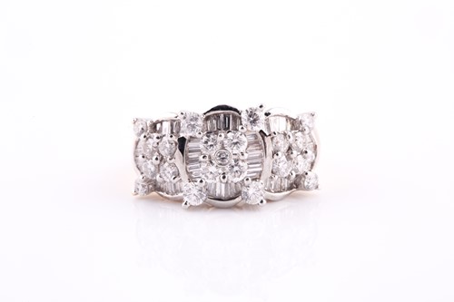 Lot 139 - An 18ct yellow gold and diamond ring, set with...