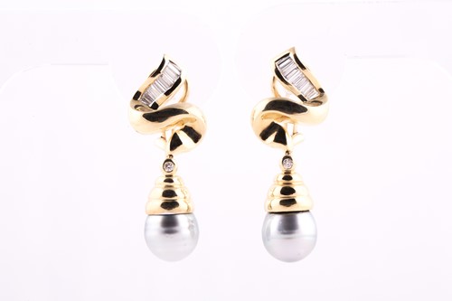 Lot 76 - A pair of yellow metal, diamond, and grey...