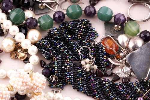 Lot 60 - A group of costume and silver jewellery,...