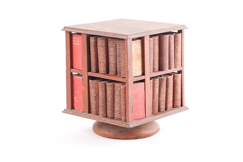 Lot 319 - A 19th-century revolving miniature bookcase,...