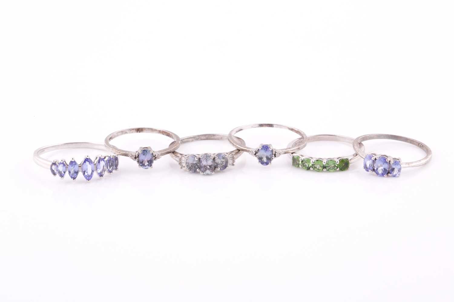 Lot 34 - A 9ct white gold and tanzanite ring, set with...