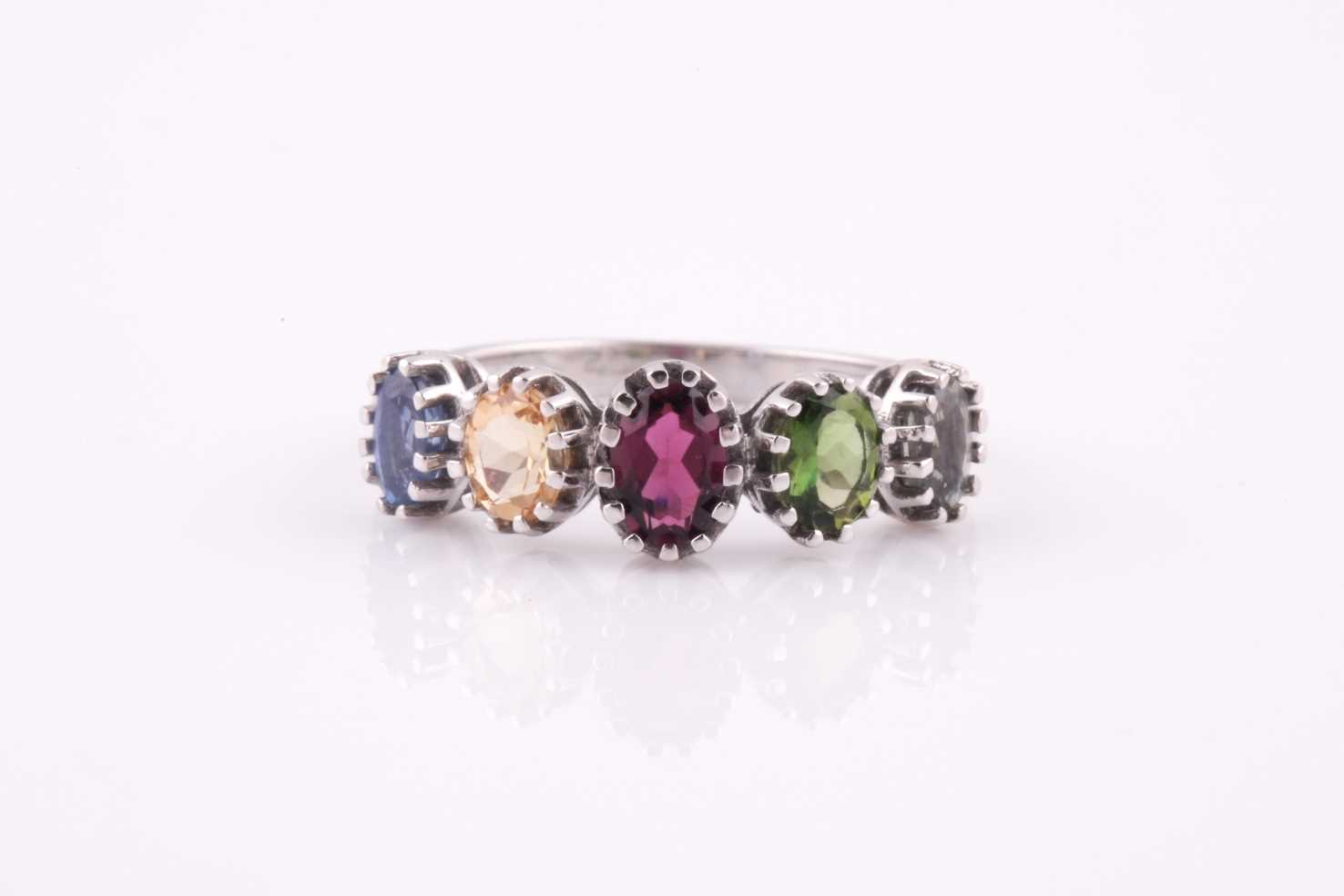 Lot 67 - A 9ct white gold and rainbow gemstone ring,...