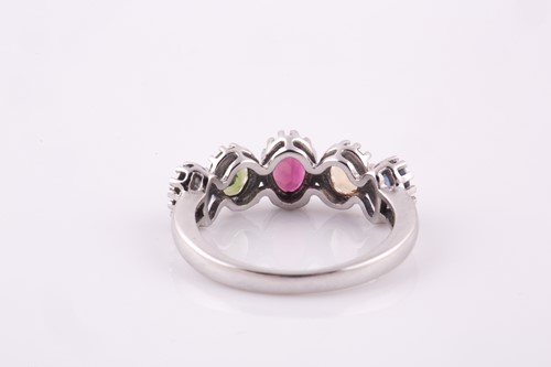 Lot 67 - A 9ct white gold and rainbow gemstone ring,...